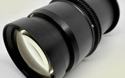 Large diameter lens for shielded camera